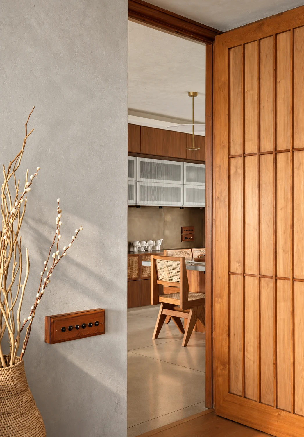House By The Sea, Malabar Hill — Dining doorway joinery. Built interior photograph; AI-retouched.